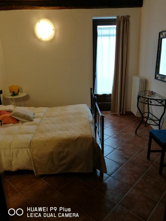 Postel nebo postele na pokoji v ubytování Agriturismo Davide
