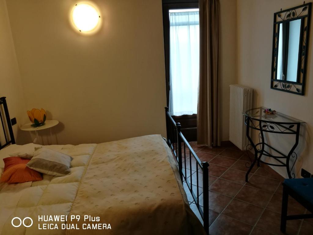 Postel nebo postele na pokoji v ubytování Agriturismo Davide