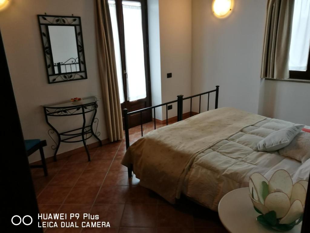 Postel nebo postele na pokoji v ubytování Agriturismo Davide