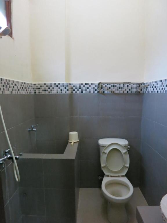 Koupelna v ubytování Sartika Hotel Prawirotaman