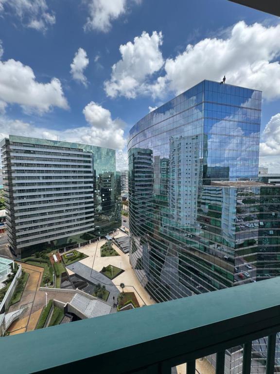 a view of a city skyline with tall buildings at Fusion e Vision Flats in Brasília