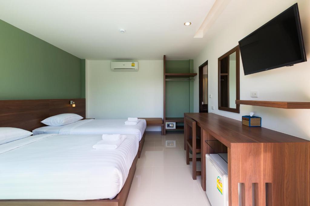 Postel nebo postele na pokoji v ubytování Parida Resort