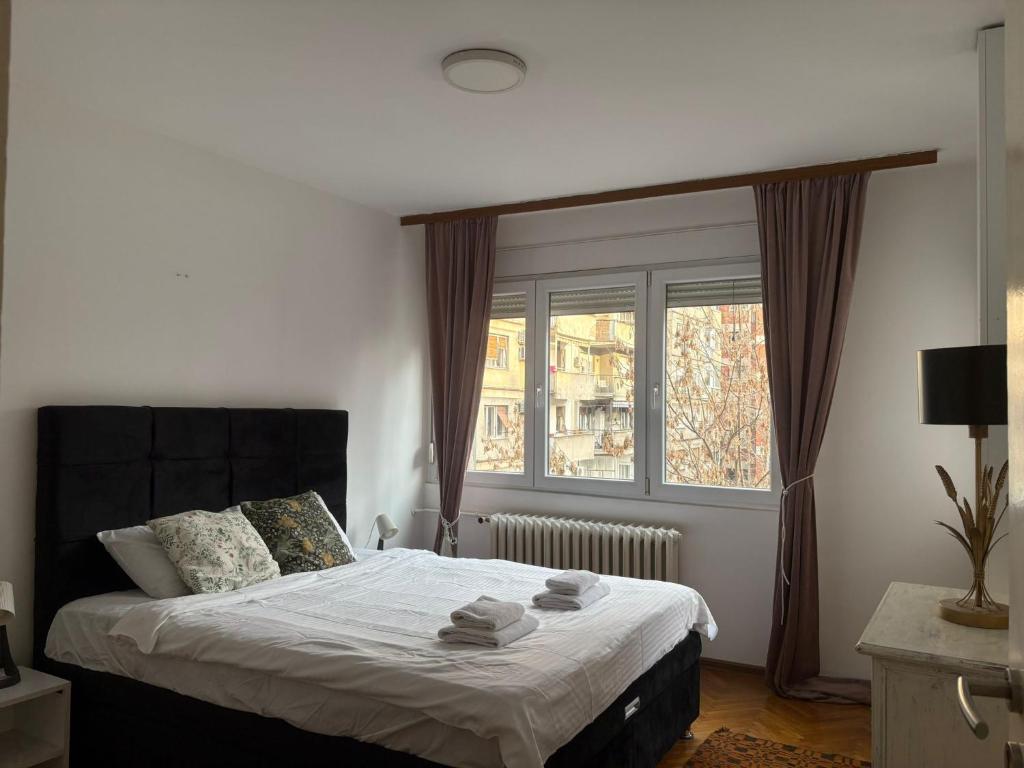 Llit o llits en una habitació de Star apartment