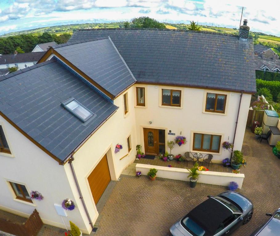 an aerial view of a house with a solar roof at Ty Melin in Cosheston