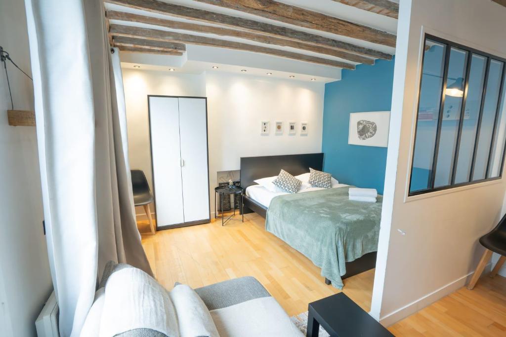 Grand studio loft bien equipe a Paris 15 - 2P