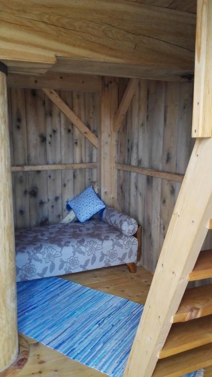 Voodi või voodid majutusasutuse Ohessaare Tuulik & Rannakohvik toas