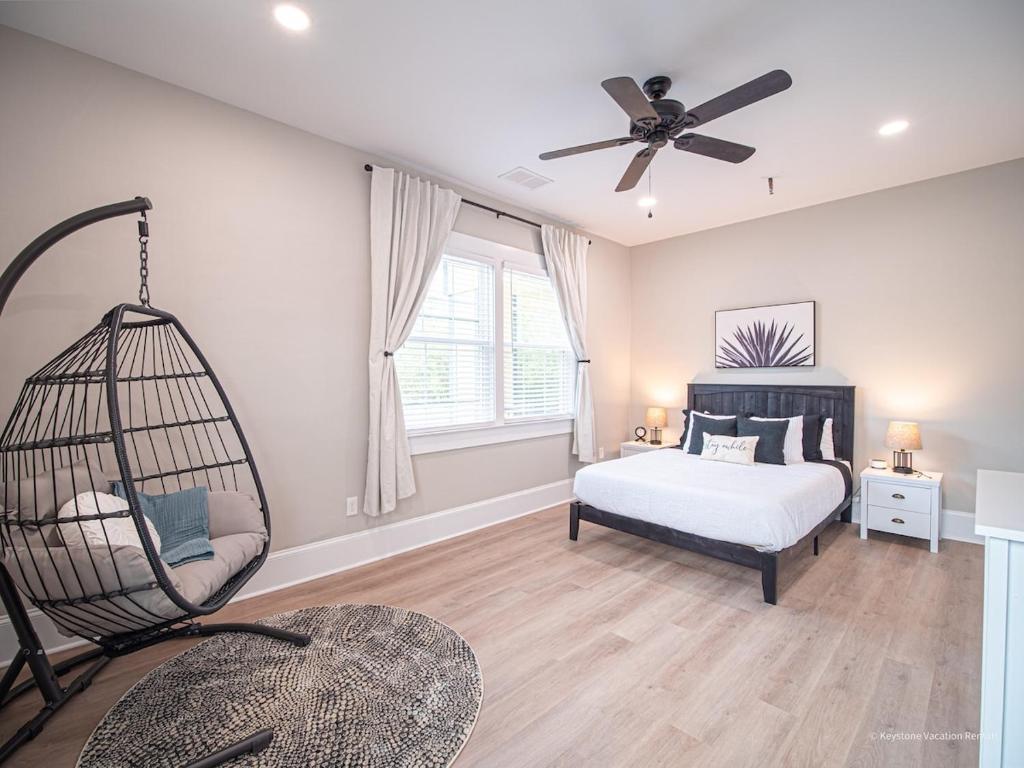 a bedroom with a hammock swing and a bed at The Maison at Marietta Square in Marietta
