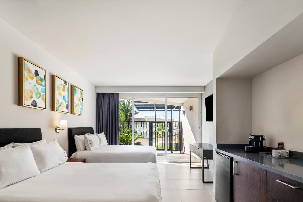 Cama o camas de una habitación en Sunvivia by Fiesta Americana Mazatlán