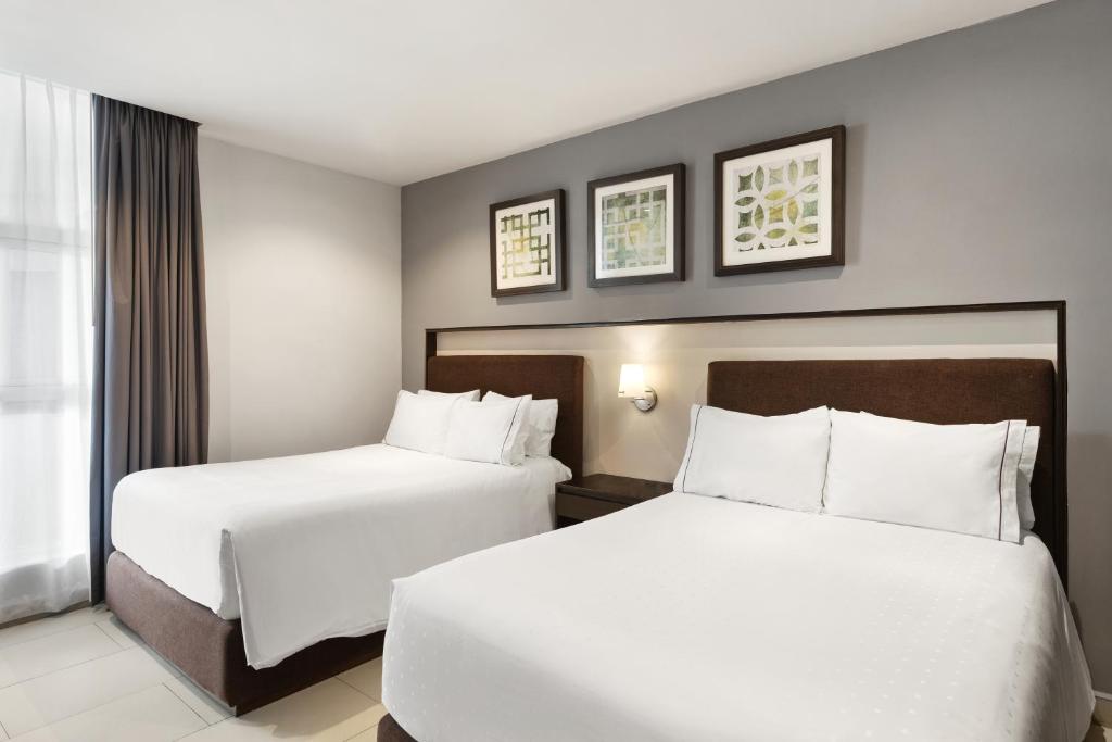 Cama o camas de una habitación en Sunvivia by Fiesta Americana Mazatlán