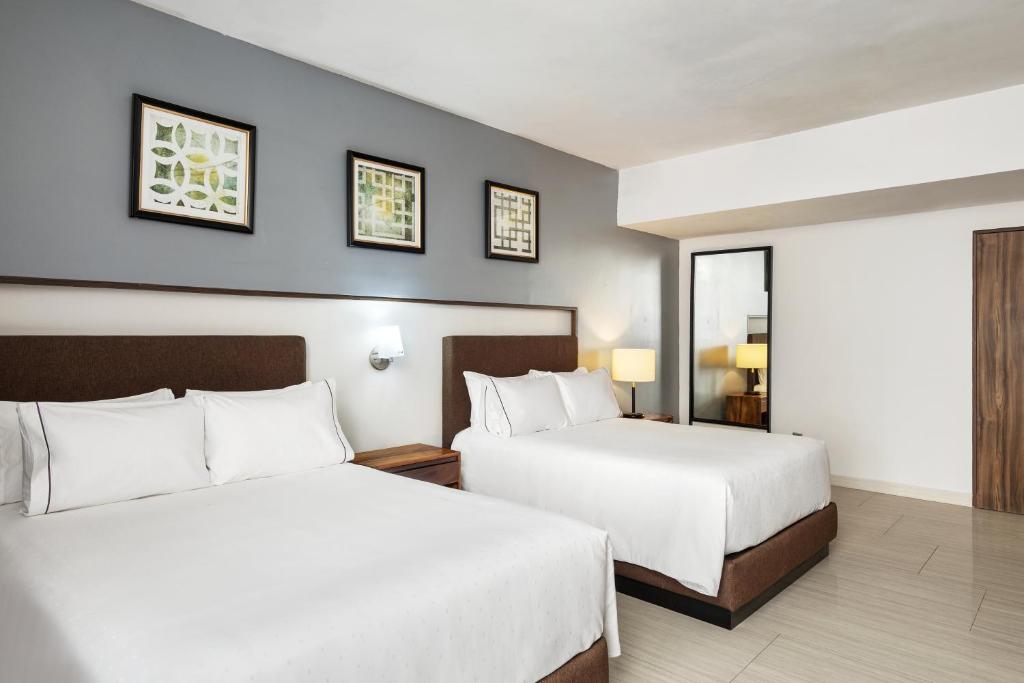 Cama o camas de una habitación en Sunvivia by Fiesta Americana Mazatlán