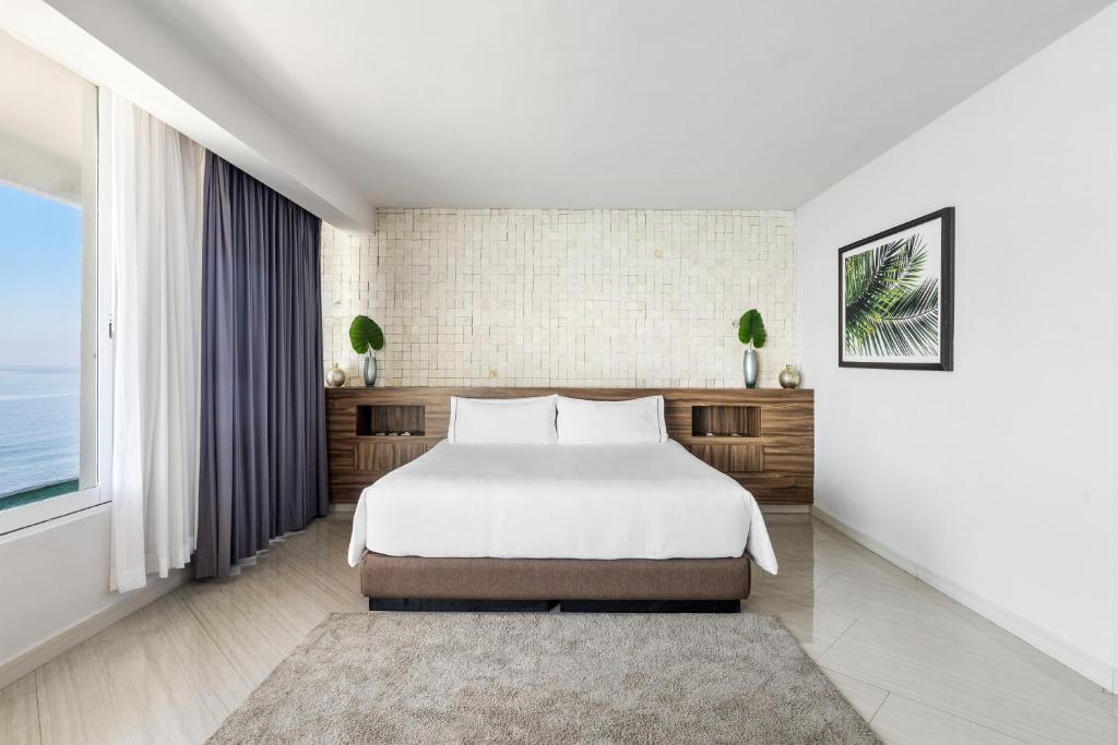 Cama o camas de una habitación en Sunvivia by Fiesta Americana Mazatlán