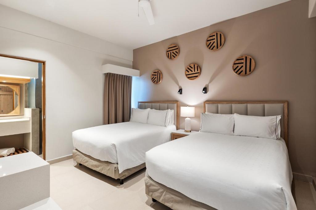 Cama o camas de una habitación en Sunvivia by Fiesta Americana Mazatlán