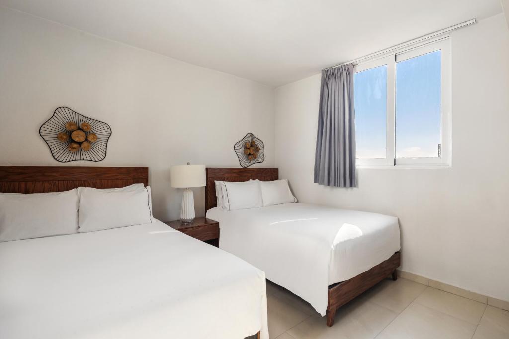 Cama o camas de una habitación en Sunvivia by Fiesta Americana Mazatlán