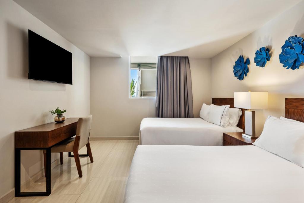 Cama o camas de una habitación en Sunvivia by Fiesta Americana Mazatlán