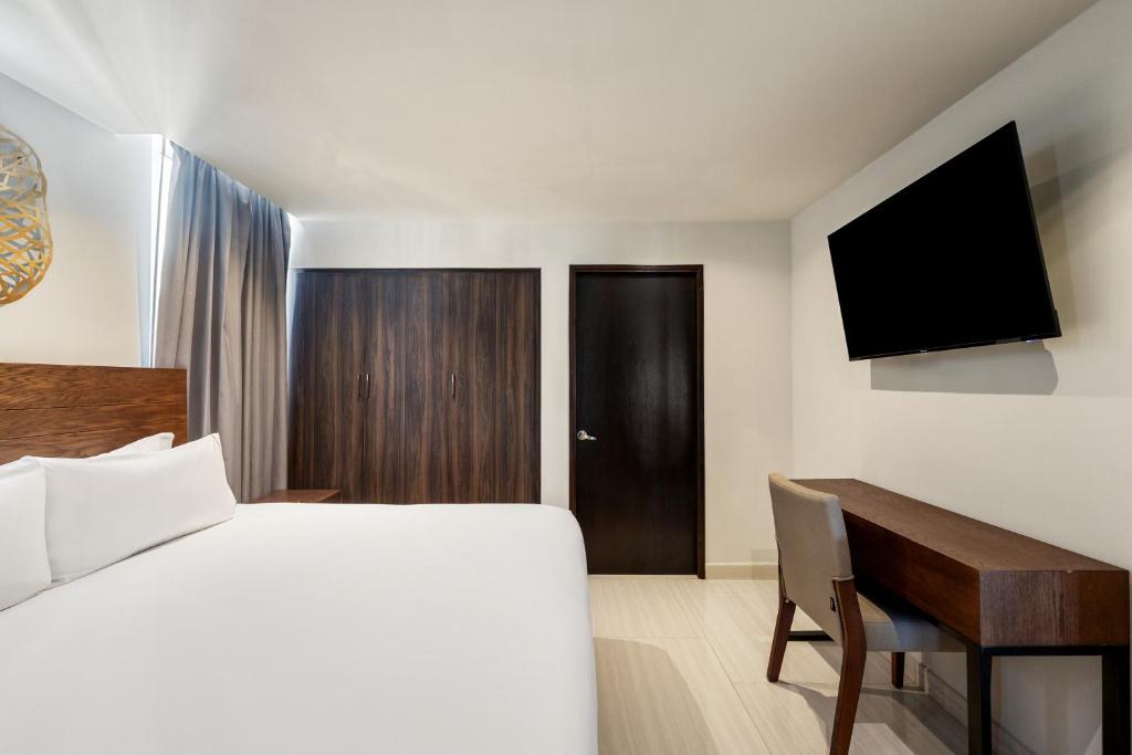 Cama o camas de una habitación en Sunvivia by Fiesta Americana Mazatlán
