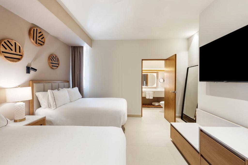 Cama o camas de una habitación en Sunvivia by Fiesta Americana Mazatlán