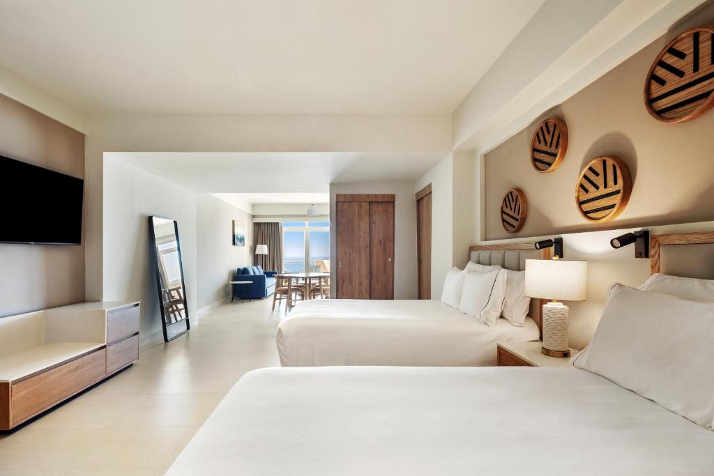 Cama o camas de una habitación en Sunvivia by Fiesta Americana Mazatlán