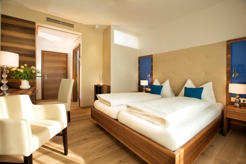 Postel nebo postele na pokoji v ubytování Hotel Wende