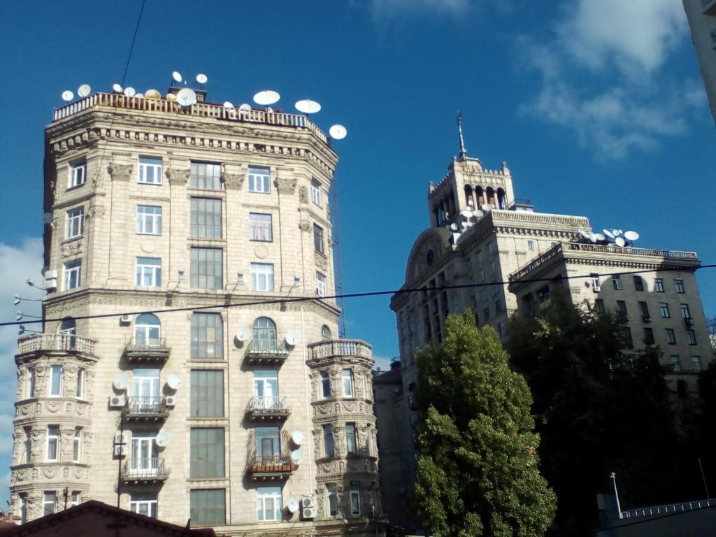 two tall buildings are next to each other at Smile Khreschatyk Kyiv in Kyiv