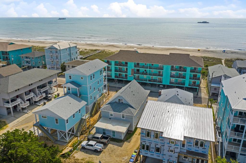 an aerial view of a resort near the beach at Sand Dollar Suites 1 in Carolina Beach