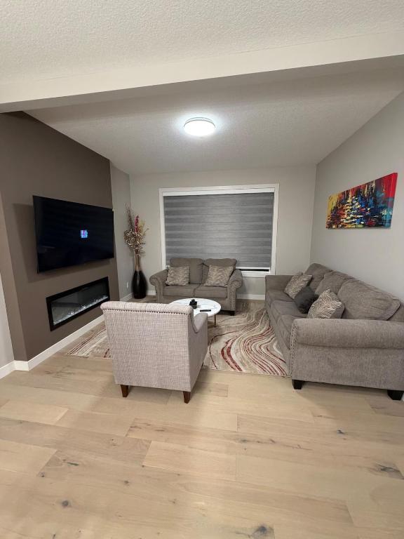 Predel za sedenje v nastanitvi 4 Bedroom Duplex house