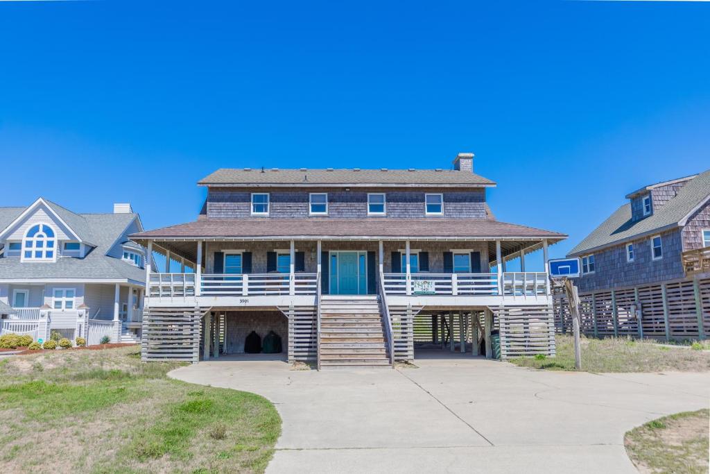 a large house with a wrap around porch at 5451 - Richardson in Nags Head