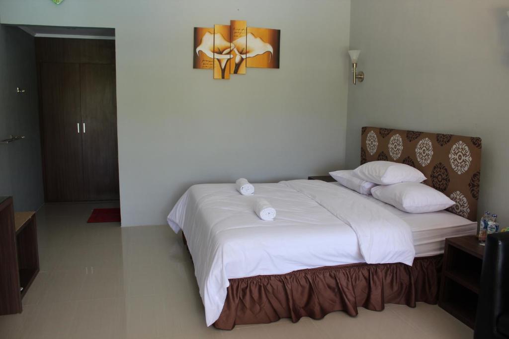 Postel nebo postele na pokoji v ubytování Anoi Itam Resort