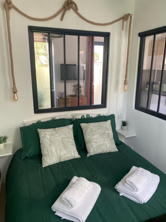 Llit o llits en una habitació de L'escapade