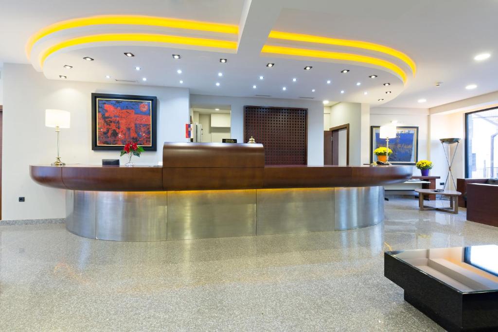 TV a/nebo společenská místnost v ubytování Hotel Sterling Garni