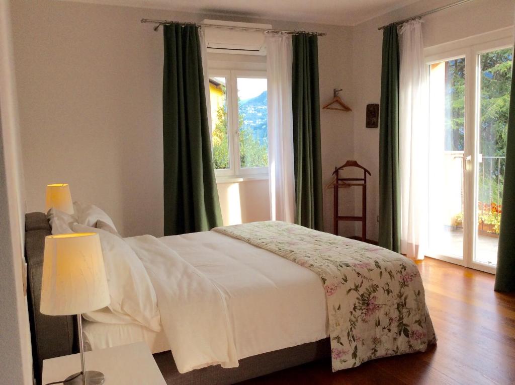 Posteľ alebo postele v izbe v ubytovaní Villa dei Fiori