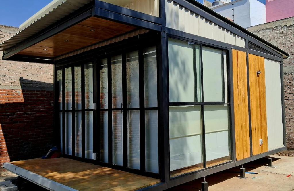 a tiny house is being built on a trailer at TinyHome Texcoco in San Miguel Coatlinchán