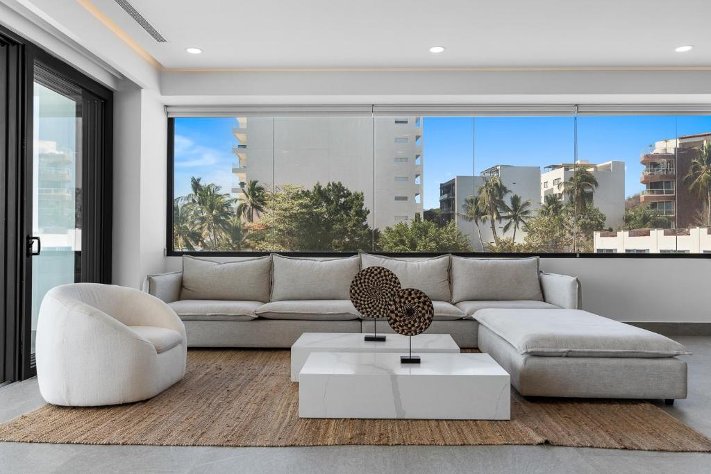 Bantay Beachfront Living - Ocean Views & Luxury Amenities - 四卧室豪华公寓