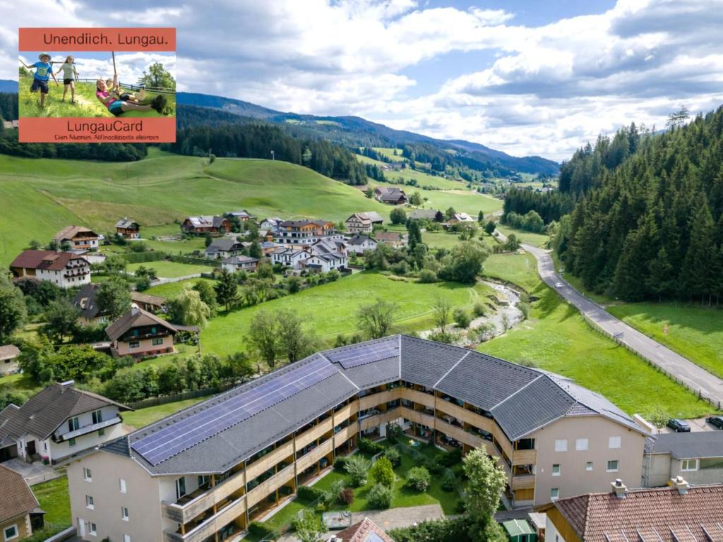 an aerial view of a building in a village at Lungau Residence in Tamsweg