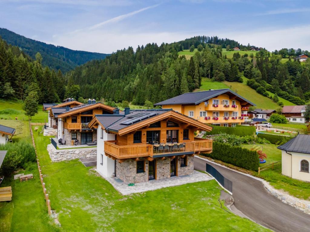 an aerial view of a house in the mountains at Wagrainer TauernLodge 42A in Wagrain