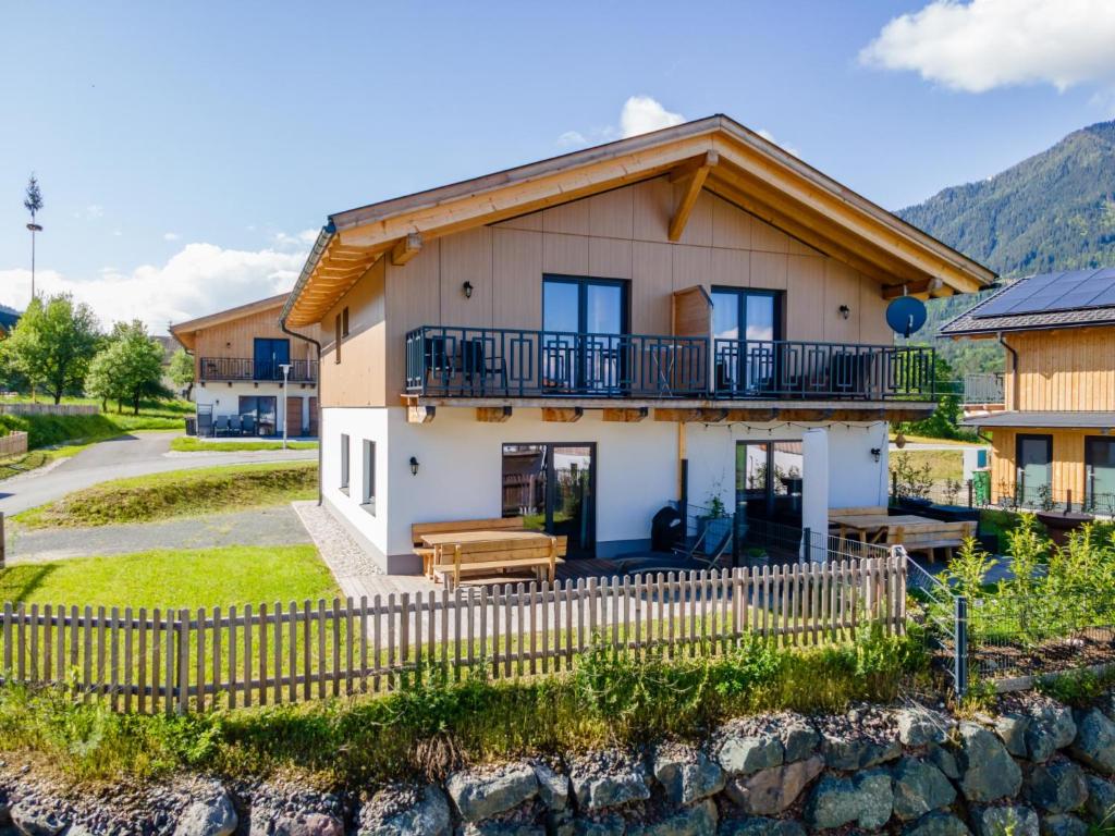 a house with a fence in front of it at Obermöschach 7A in Obermöschach