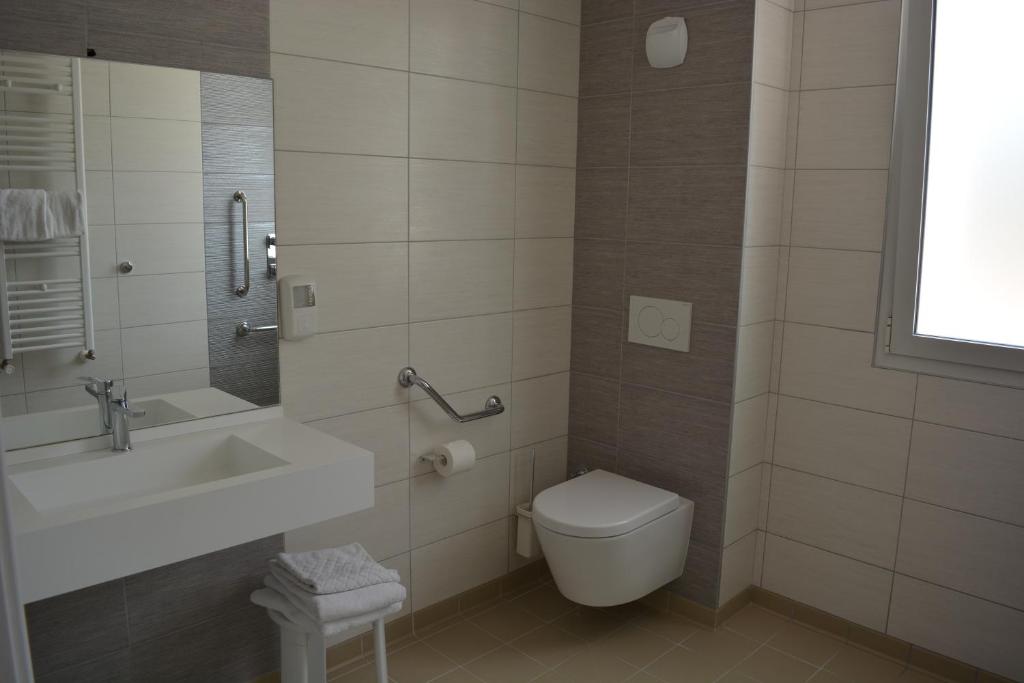 Koupelna v ubytování Hôtel Valencia