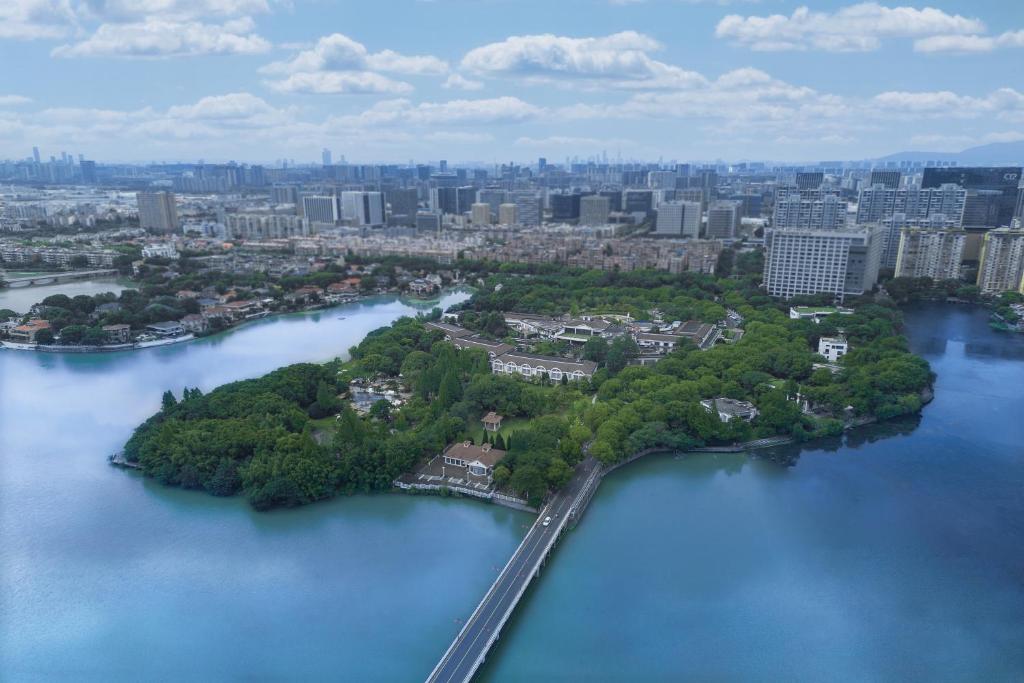 an island in the middle of a large body of water at Jinling Resort Nanjing in Nanjing