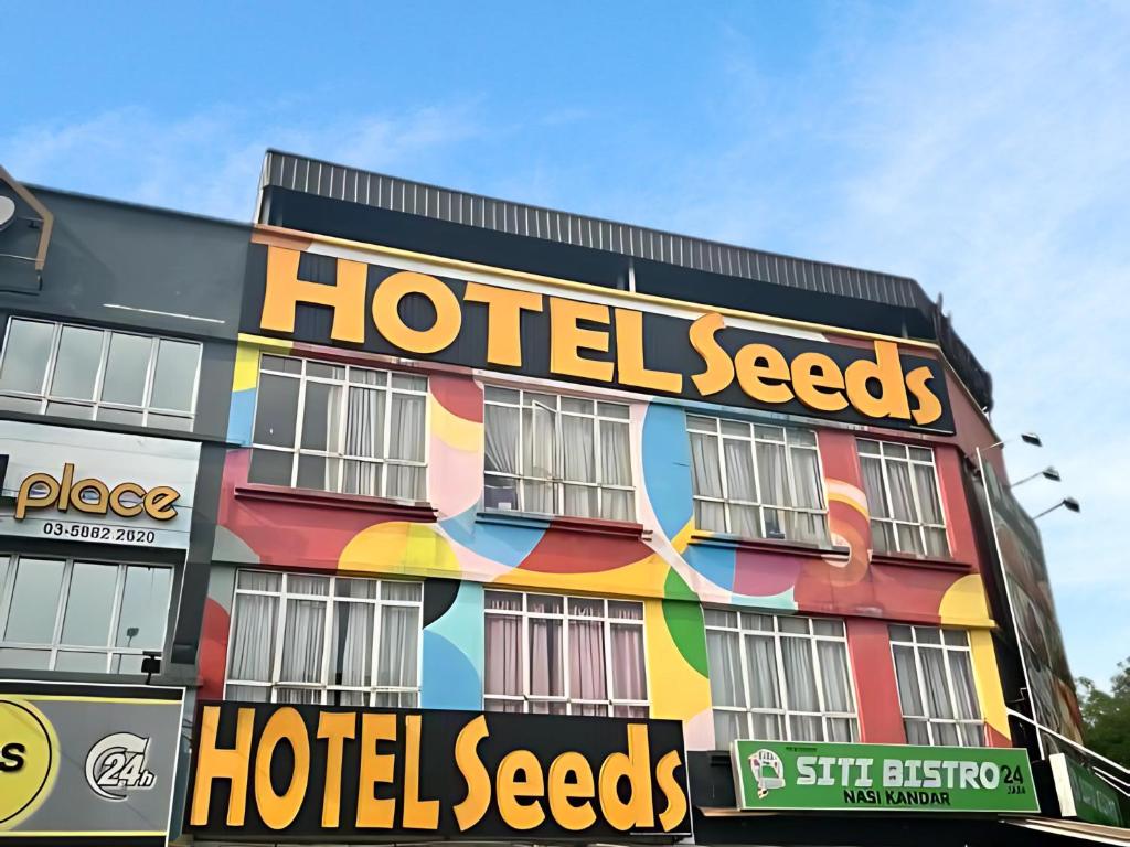 a building with a hotel secrets sign on it at Seeds Hotel Shah Alam Seksyen 7 I-City in Shah Alam
