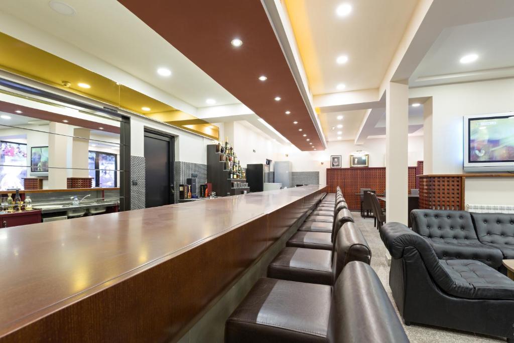 TV a/nebo společenská místnost v ubytování Hotel Sterling Garni