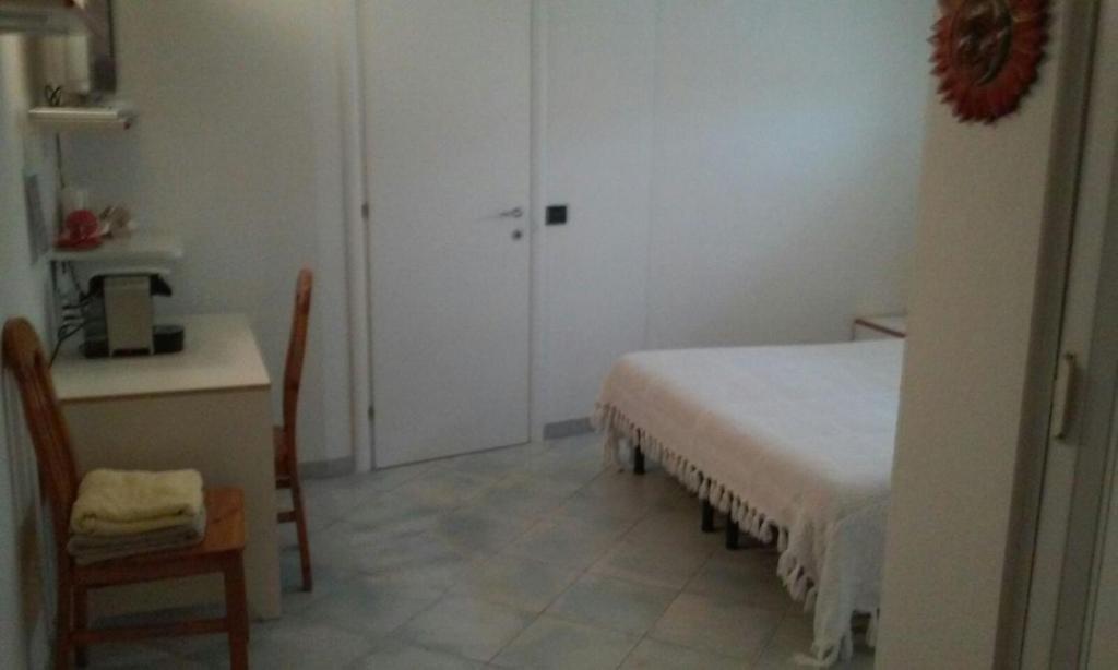 Postel nebo postele na pokoji v ubytování B&B Al Verde & Mare