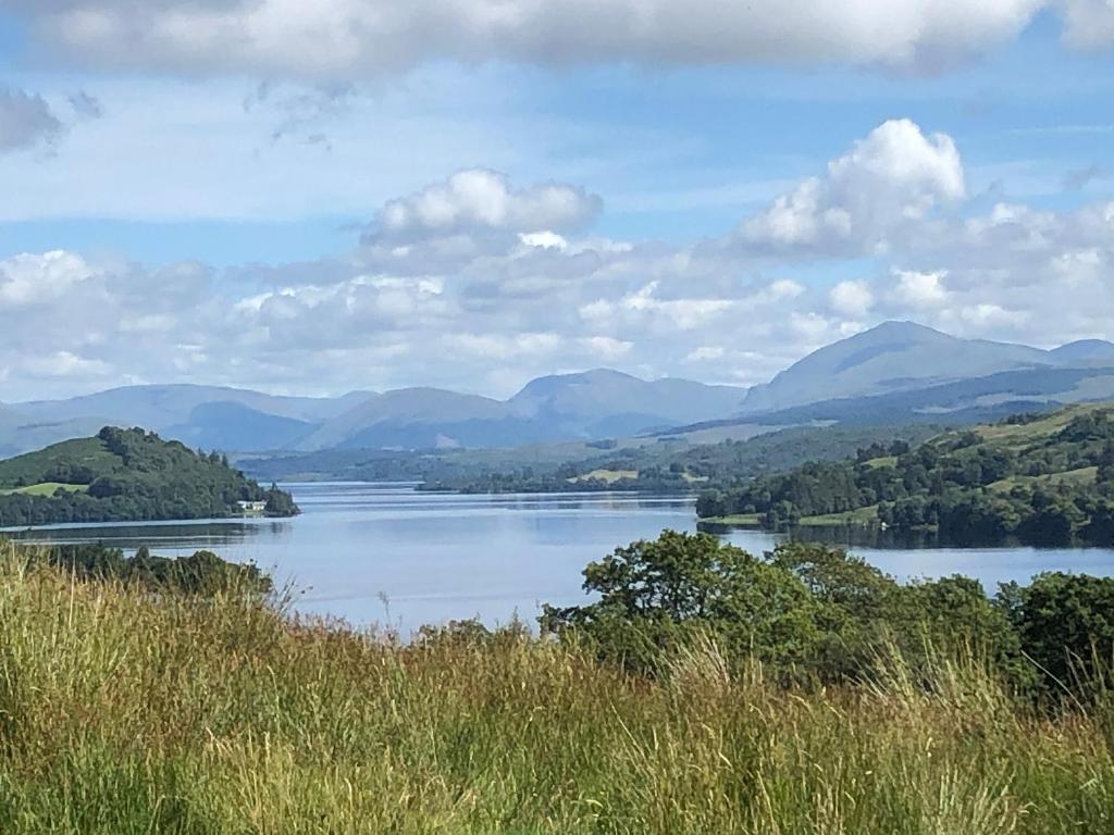 a view of a lake with mountains in the background at Uk7522 - Science in Dallavich
