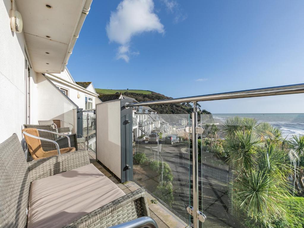 a balcony with a view of the ocean at 10 Mount Brioni in Downderry