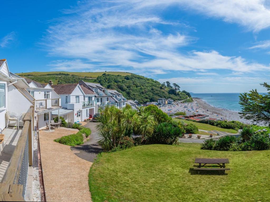 a view of the beach from the balcony of a house at 11 Mount Brioni - Ukc5345 in Torpoint