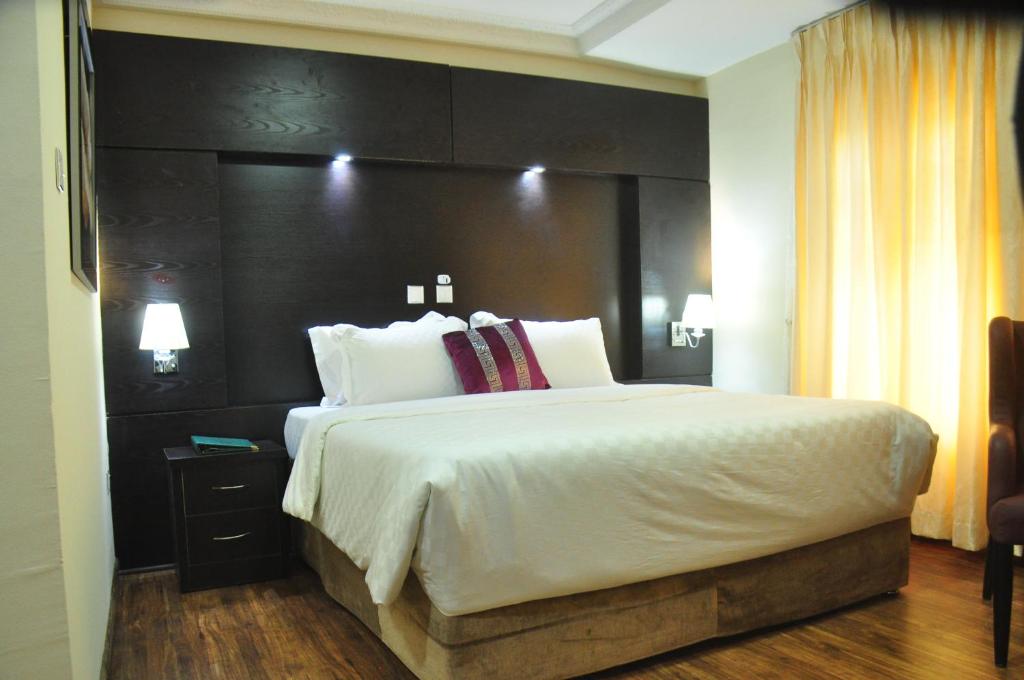 Voodi või voodid majutusasutuse Citiheight Hotel toas