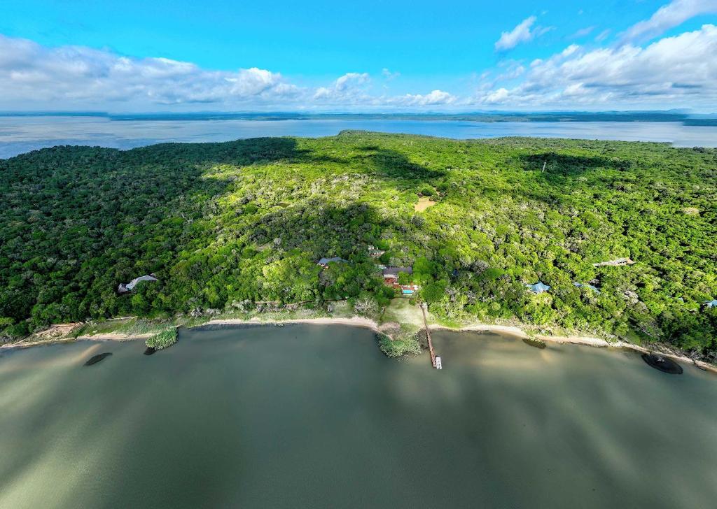 an aerial view of a small island in the water at Malkoha Lake St Lucia in Hluhluwe