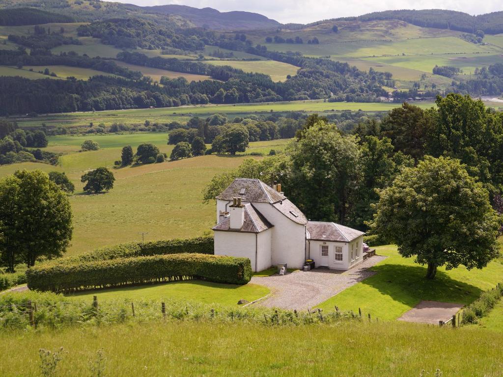 a house on a hill in a green field at Castle Peroch-Uk5698 in Logierait
