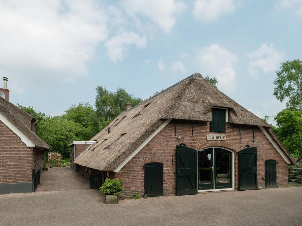 Imagen de la galería de Attractive holiday home with a wood stove, located on a farm, en Heeten