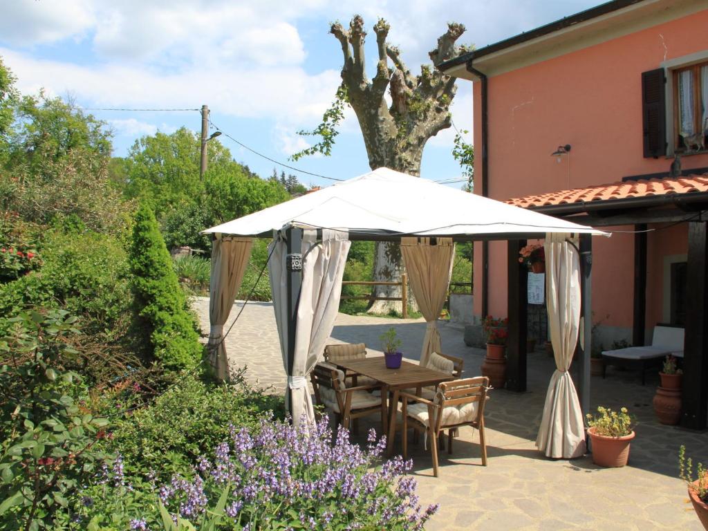 A patio or other outdoor area at Holiday Home in Canossa with Swimming Pool Garden and Patio