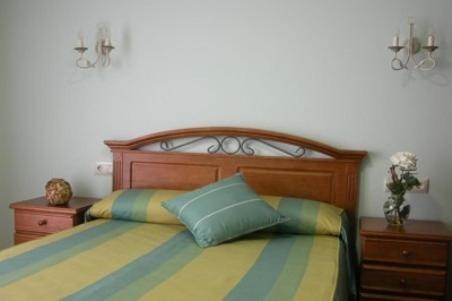 Postel nebo postele na pokoji v ubytování Hostal la Cepa