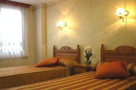 Postel nebo postele na pokoji v ubytování Hostal la Cepa